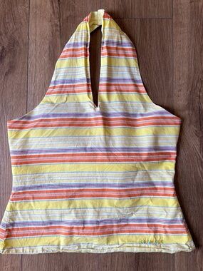 Light Yellow Women's Top with Subtle Tag Detail